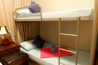 คอนเนกติงไฟลท์ มักตันเซบู โฮสเทล โรงแรมใน