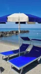 THE MERIDIANA APARTMENT ON THE SEA WITH PRIVATE BEACH SDRAIO AND UMBRELLA Hotels near Giardini Ravino