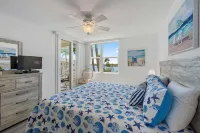 Balcony with Stunning Water Views and Pool - Gorgeous Waterfront Escape