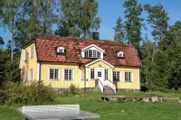 Barnens Ö Hotels near Singö