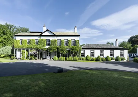 Statham Lodge Hotel Отели в г. Вулстон