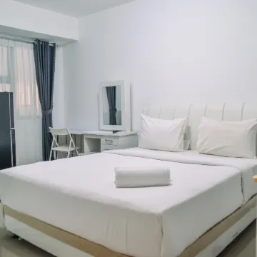 Minimalist Studio Room at Urbantown Serpong Apartment