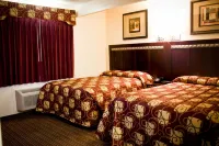 Whispering Palms Inn - 2-Star
