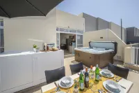 Summer Breeze Penthouse with Large Terrace and Hot Tub by Getaways Malta