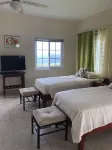 Hilltop Studio with ocean views, free daily breakfast and airport pickup.