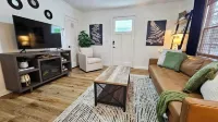 Chic Central Cottage- Wood Floors, Fireplace, Game Room & Firepit- Pet Friendly