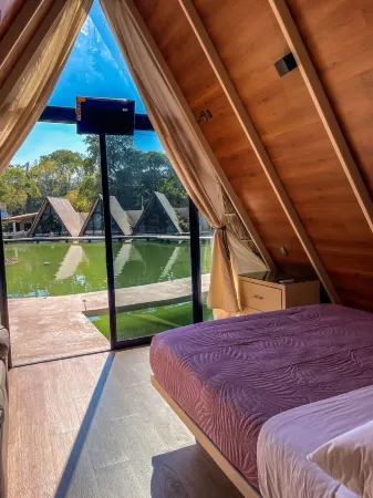 Río Hotel y Glamping Отели в г. Пьедрас Анчас