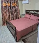 Cozy 3-bedroom townhome in enjoyable Piarco with AC, WiFi Hotels in 