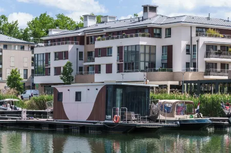 L'Escale Royale l'Isle Adam Port - Oise Отели в г. Л'Иль-Адам