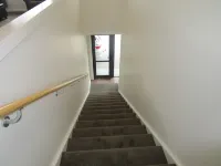 Apartment with lake, mountain & rural views.