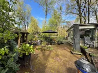 Big deluxe chalet with private jacuzzi, swimming pool on park.