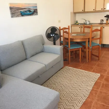 Cozy beachfront apartment with wonderful sunsets Отели в г. Эль Котильо