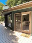 Relaxing round home with a river centrally located
