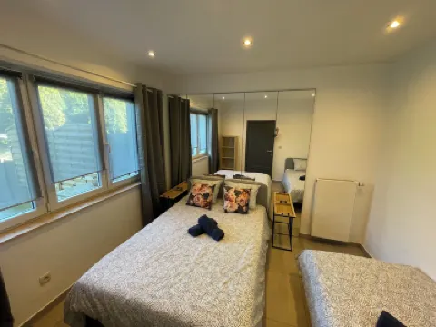 Au 11801 Bel appartement moderne Hotels in 