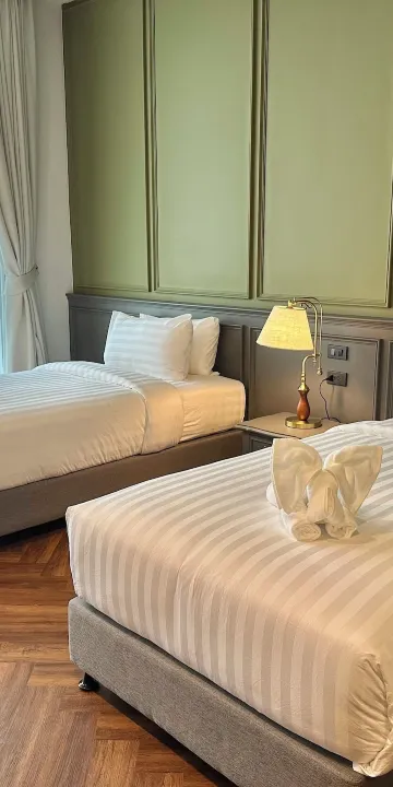 ห้องดีลักซ์ เตียงแฝด พร้อมวิวสวน