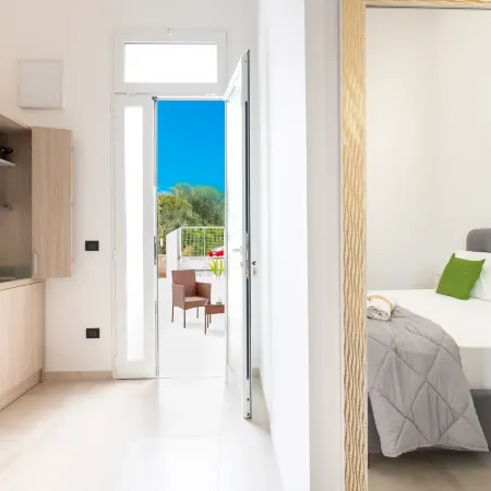 Monolocale Riva – Wi-Fi, Clima e Giardino a Torre Lapillo