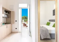 Monolocale Riva – Wi-Fi, Clima e Giardino a Torre Lapillo - 4-Star