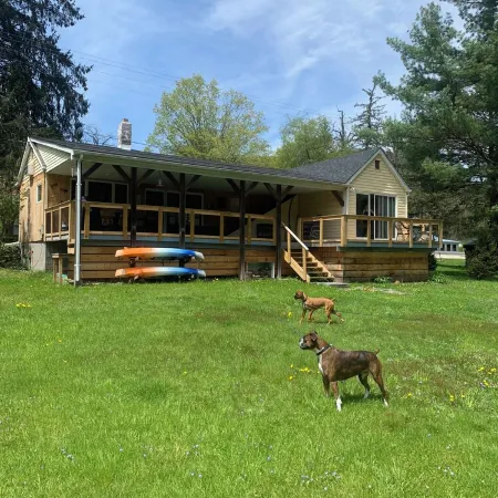 Kayak/Canoe/Fish & Relax right from the backyard of this Riverfront 3 B/R home!