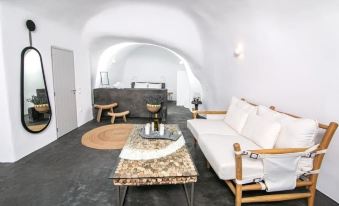 Elysian Santorini Oia Luxury Cave Villa with Outdoor Hot Tub with Sea Sunset View