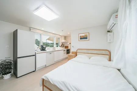 Seogwipo Samchun Camping House Pension Отели рядом с достопримечательностью «Shinhwa Theme Park»