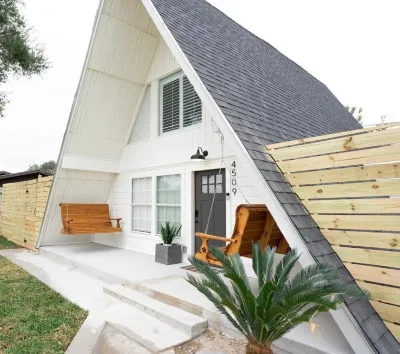 A pet friendly A-Frame with a hot tub & fire pit! Hotels near Town & Country Shopping Center