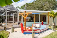 🍹🌞 Tropical Getaway! Heated Pool, Tiki Bar, Pirate Sandbox, and Boat Parking!