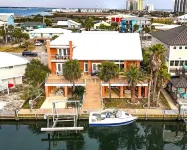 Waterfront Living, STEPS to the BEACH, Sleeps 15! Hotels near Navarre Beach Sea Turtle Conservation Center