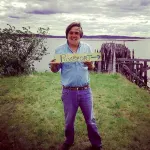 Sea-Breeze Cottage perched on the edge of the bay.