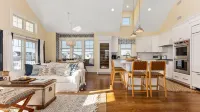 Beautiful new home, professionally decorated with pool close to town and beach