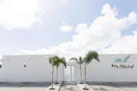 The Palm Leaf Apartments