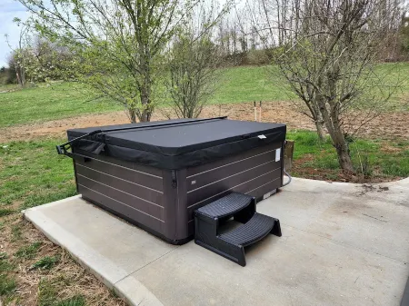 New! Custom built private home on a pond, with large hottub.