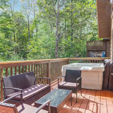 Only Minutes to Attractions with Indoor Sauna, Hot Tub, Games, and Fireplace!