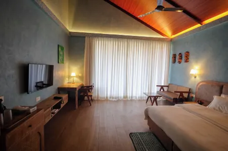 Tiki Farms Отели в г. Каламболи Тарф Уореди