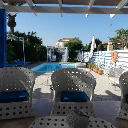 Greek Island Style 2 Bedroom Villa with Pool Next to the Sea