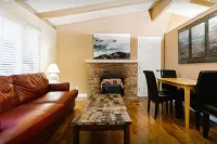 Monterey craftsman style home with vaulted exposed-beams ceiling hardwood floor