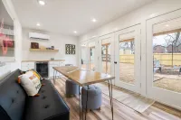 Dog-friendly home with a firepit, yard, washer/dryer, central AC & game room