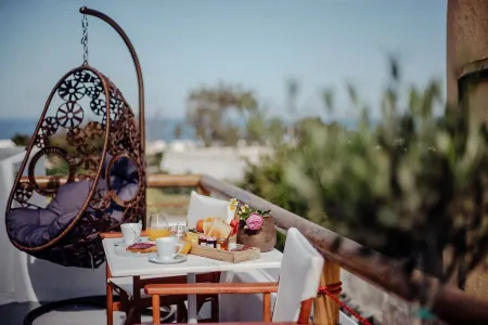 Pueblo Viejo Suites Отели рядом с достопримечательностью «Тира»