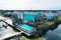 Boat Dock & Pool Private Fishing Village Roseate Spoonbill by AvantStay