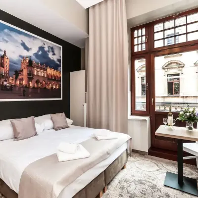 Apartamenty L5 Отели рядом с достопримечательностью «Коллегиум Майус»