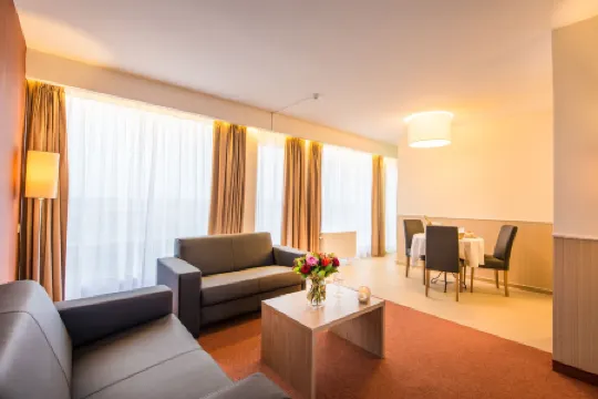 阿拉斯飯店及商務公寓