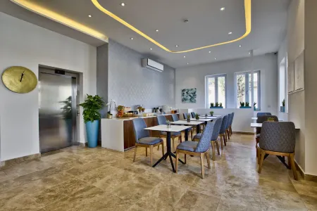 Tritoni Valletta Boutique Hotel Отели в г. Хамрун