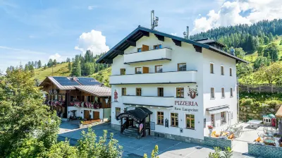 Ferienwohnungen Restaurant Pizzeria Langreiter