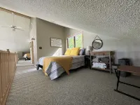 Lakeside home on one acre with private beach 90 minutes from the Twin Cities