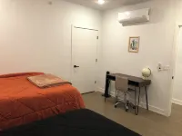 Cozy Downtown Loft: 2BR condo w/ AC, WiFi, Balcony & Free 2-car parking.