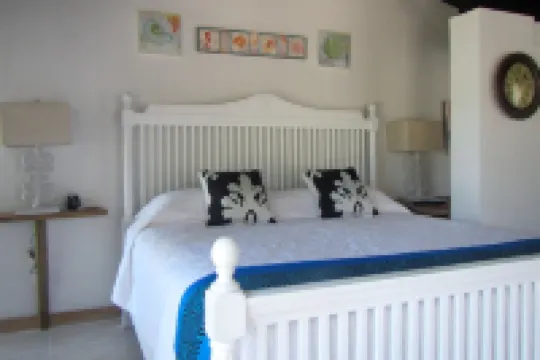 Private and Dreamy.....Balcony, Wine, Sunset,  Upstairs with its own entrance! Hotels in Sandys