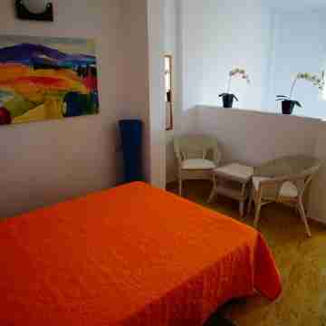 Spacious terraced house for up to six people with communal pool Rooms