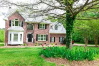 Modern secluded home minutes from DT Raleigh and NCstate Hotels near Lake Wheeler Rd