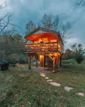 Treehouse lifted up over a stocked trout pond up in the beautiful birch trees!