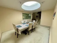 Cheerful 4-bedroom bungalow with indoor fireplace.