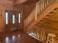 Secluded cozy cabin nestled among the hemlocks and rock formations in Hocking